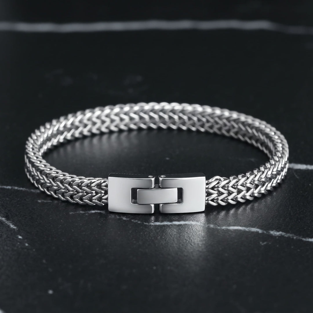 Foxtail Bracelet (Silver) lying on black marble