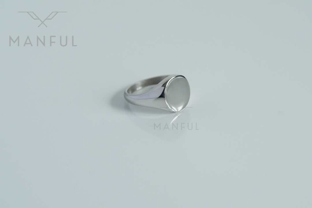 Classic Silver Signet Ring, angled close-up on a plain light background