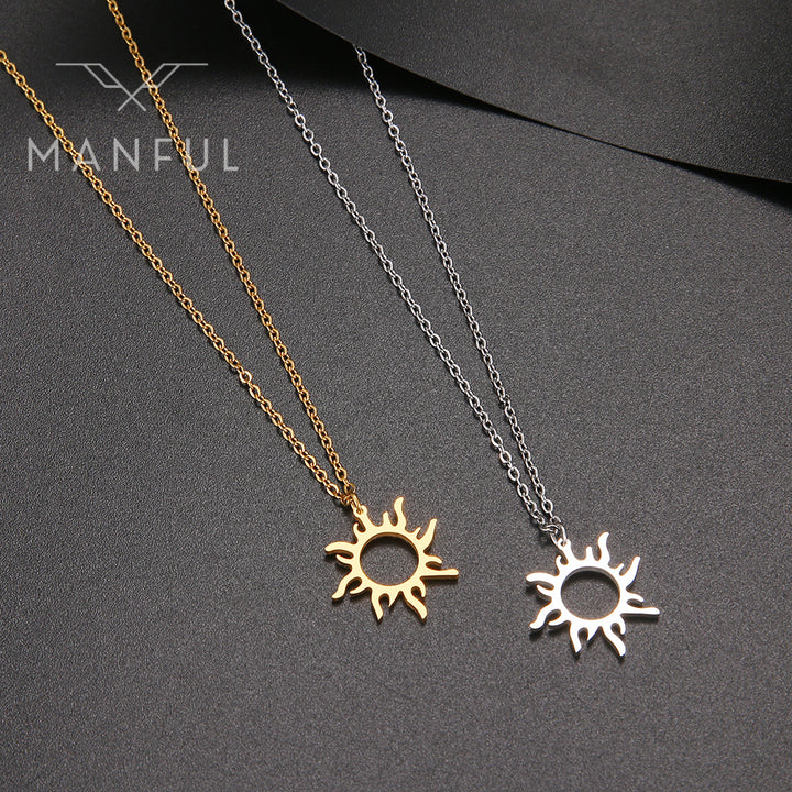 Sun Pendant Necklace Silver, paired with a gold version on a dark background, chains draped wide