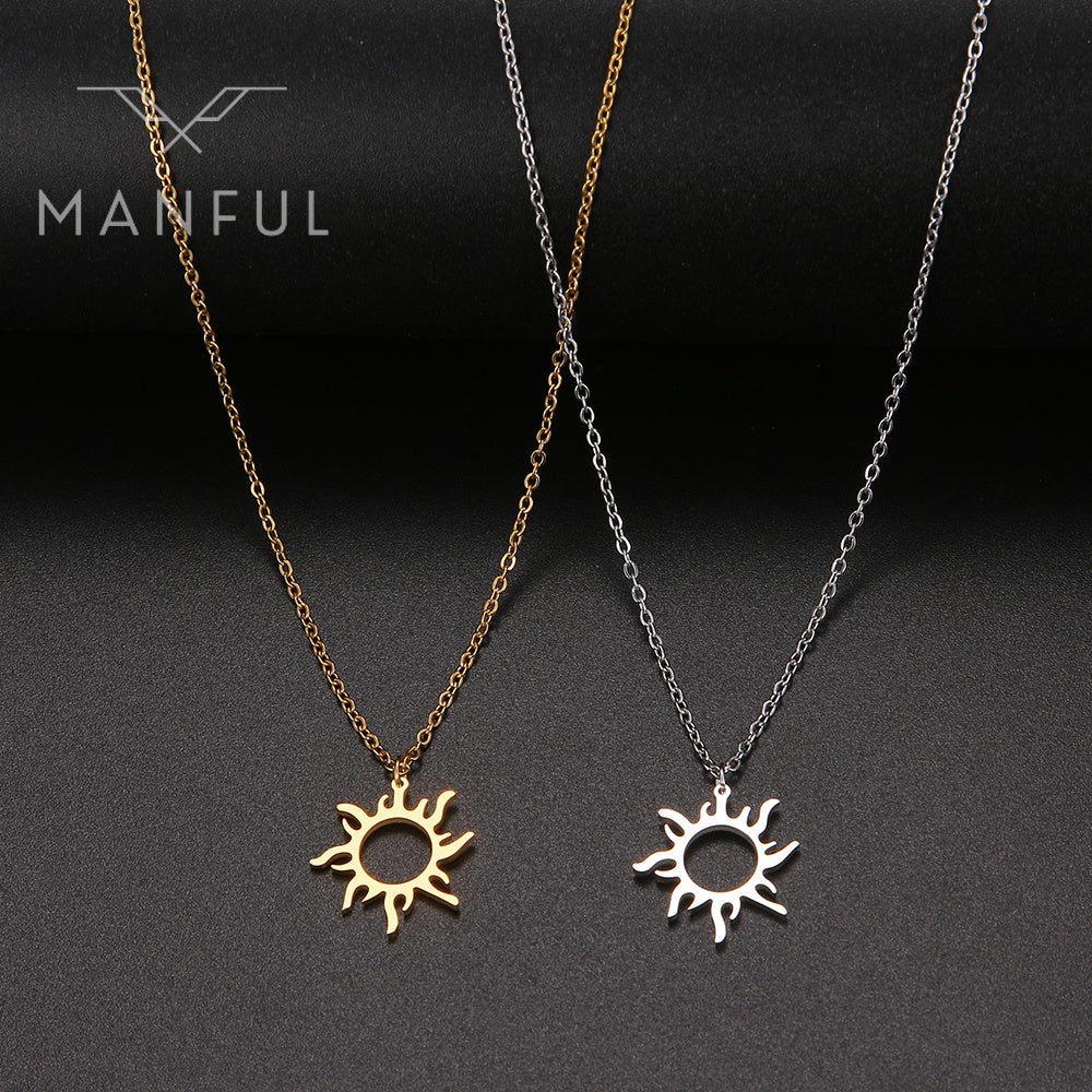 Sun Pendant Necklace Silver, paired with a gold version on a dark background, chains hanging straight