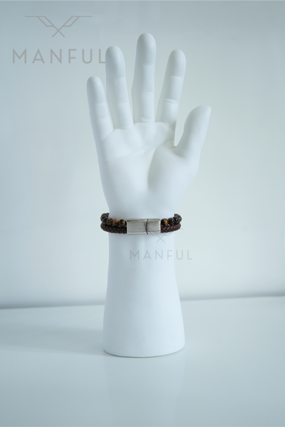 Tigers Eye Bead And Leather Bracelet Silver, worn on a man's wrist against a plain white background
