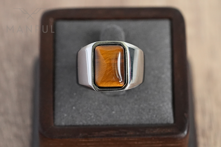 Tigers Eye Signet Ring Silver, displayed in an open wooden ring box with grey velvet lining