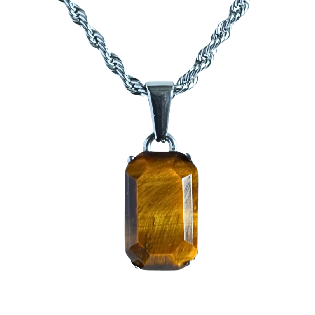 Tigers Eye Stone Pendant Silver, isolated on a white background hanging straight on a rope chain