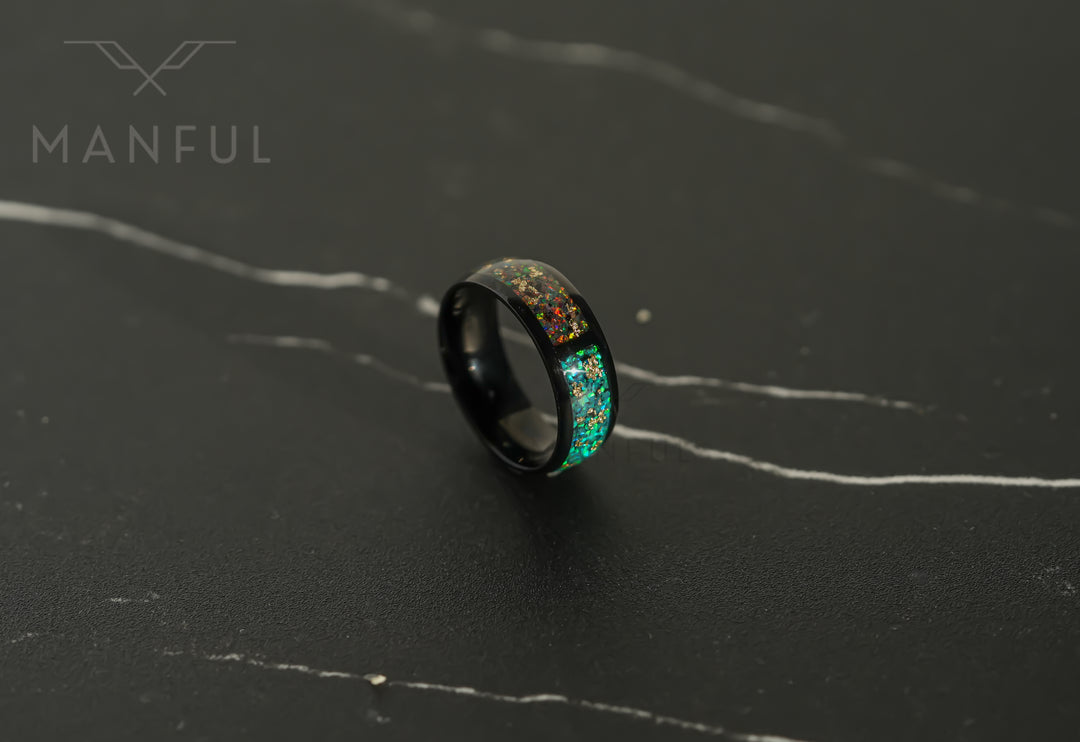 Trinity Opal Ring, standing at an angle on a dark marble surface