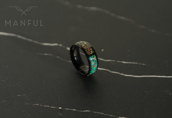 Trinity Opal Ring, standing at an angle on a dark marble surface