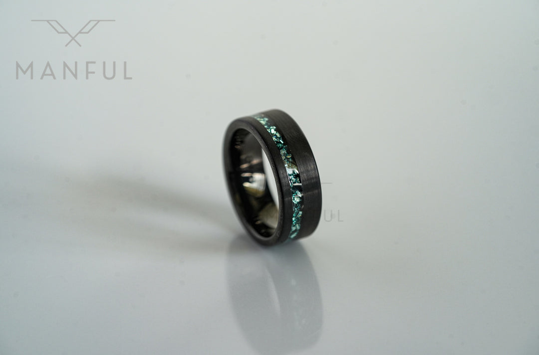 Tungsten Aquamarine Inlay Band Black, standing upright on grey with its reflection below