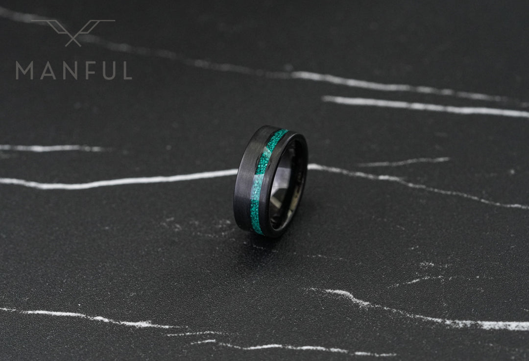 Tungsten Malachite Inlay Band Black, standing upright on dark marble facing the camera