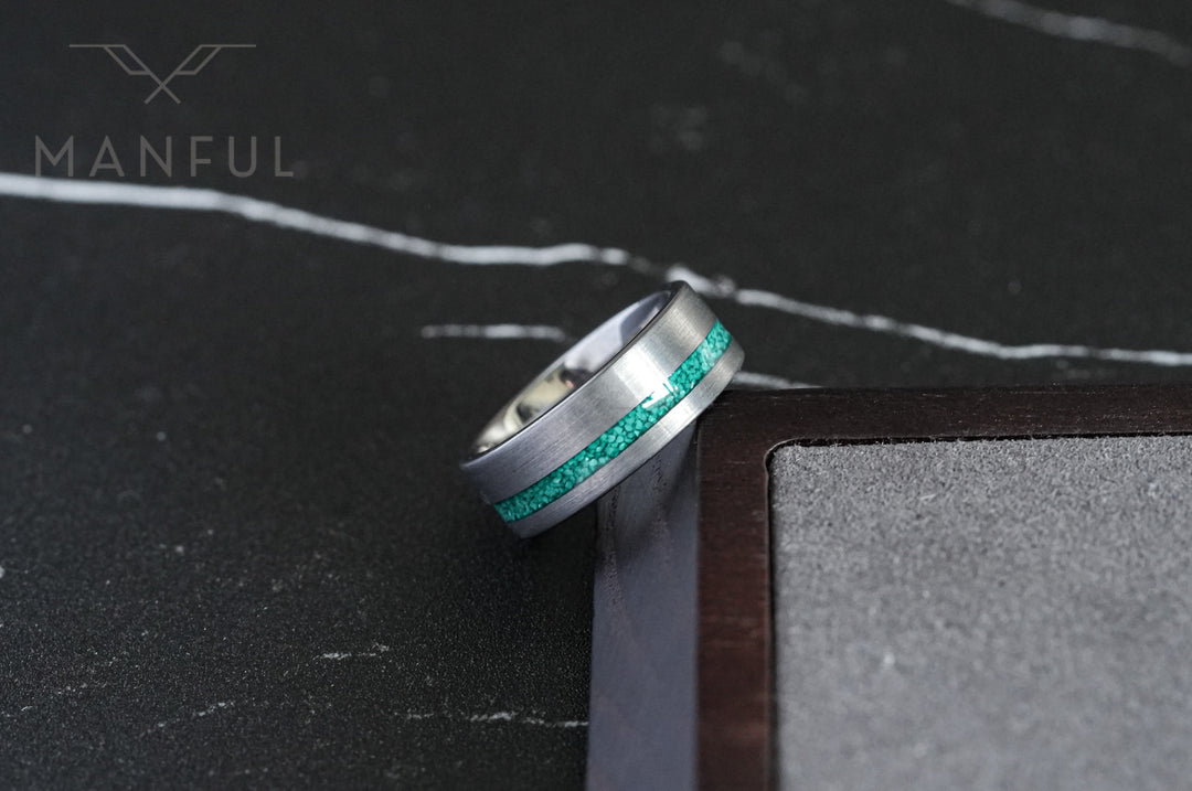 Tungsten Malachite Inlay Band Silver, close-up on a wooden block corner showing the brushed finish