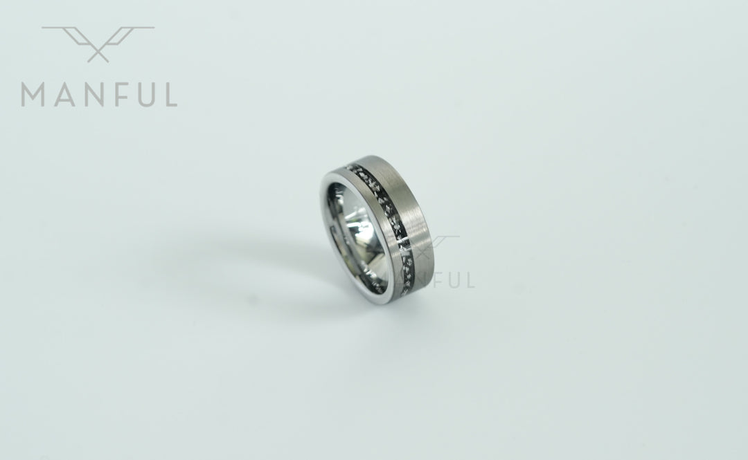 Tungsten Meteorite Inlay Band Silver, standing off-center on a white background