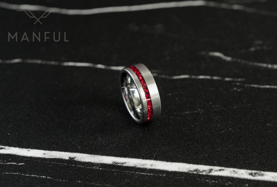 Tungsten Red Opal Inlay Band Silver, standing on dark marble at an angle showing the red inlay